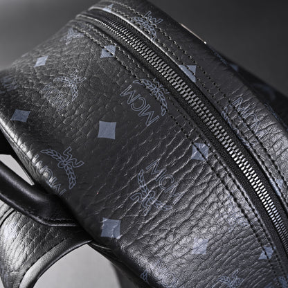 MCM Stark Visetos Medium Backpack – Black Monogram with Studded Detailing