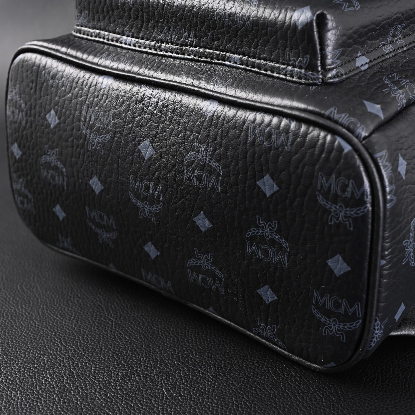 MCM Stark Visetos Medium Backpack – Black Monogram with Studded Detailing