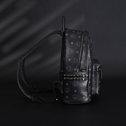 MCM Stark Visetos Medium Backpack – Black Monogram with Studded Detailing