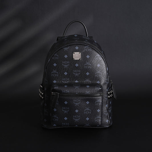 MCM Stark Visetos Medium Backpack – Black Monogram with Studded Detailing