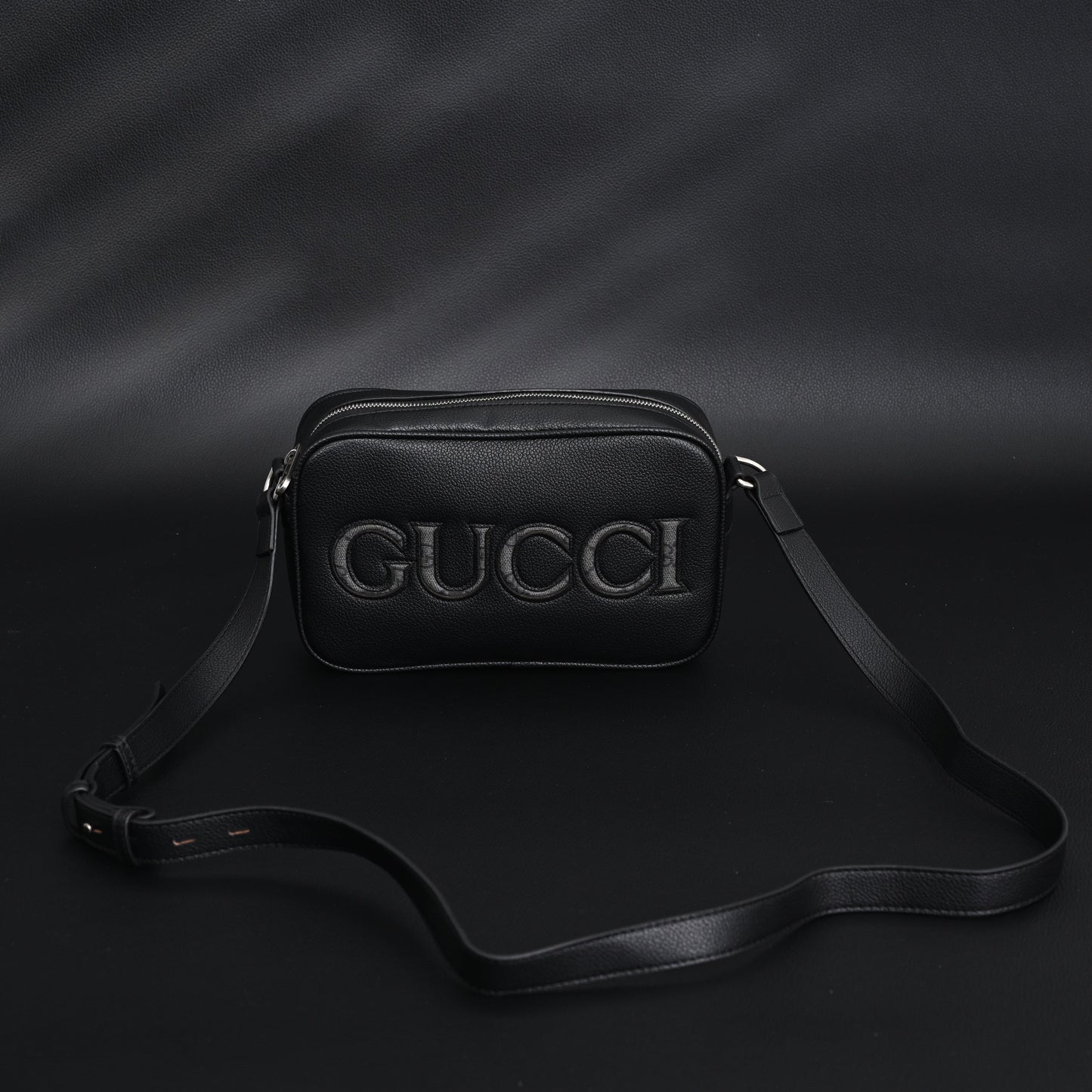 Gucci Black Leather Embossed Logo Belt Bag