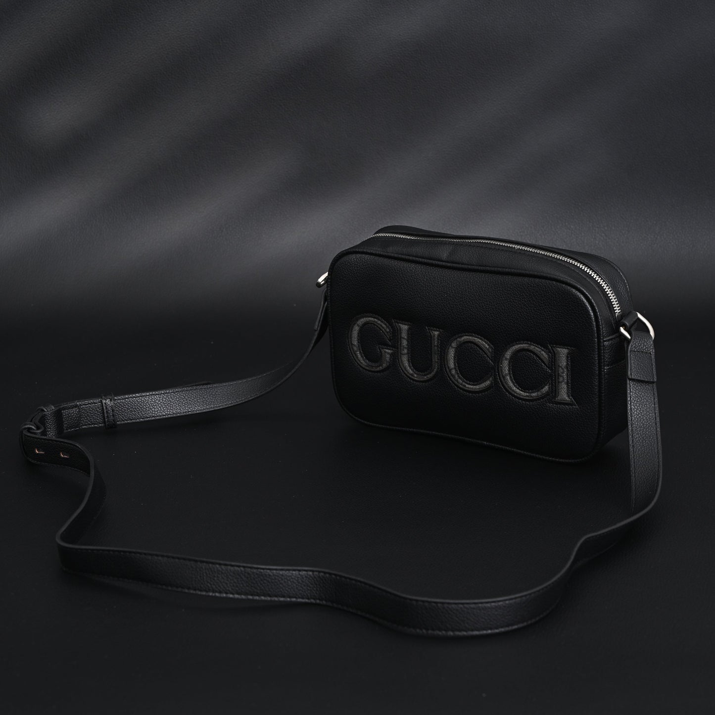 Gucci Black Leather Embossed Logo Belt Bag