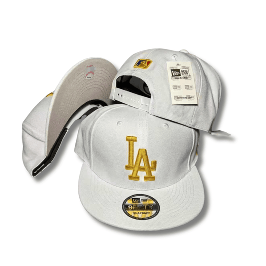 LA Dodgers with Gold Embroidered Logo White – Snapback Cap